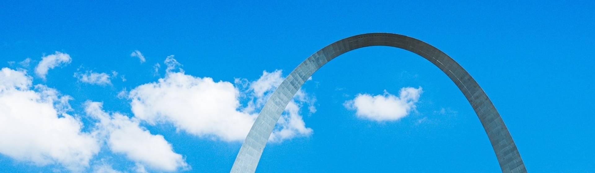 Gateway Arch against blue sky to represent where to buy e-bikes in Missouri