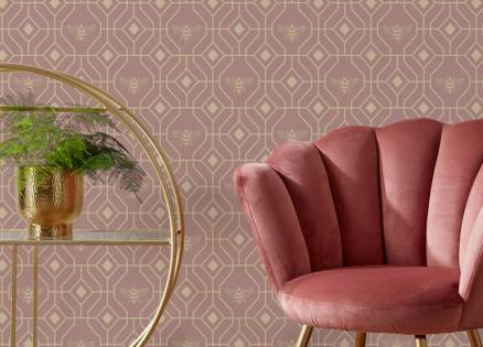 Pink wallpaper with gold accents