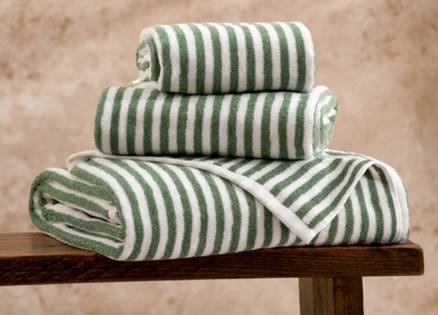 three stacked green striped hebden towels