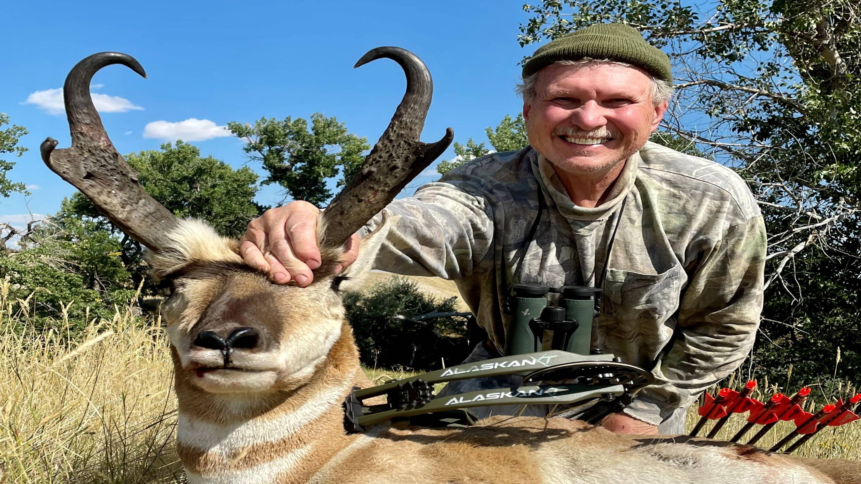 Chuck Adams with Bear Archery Alaskan XT RTH compound bow with a harvested antelope.
