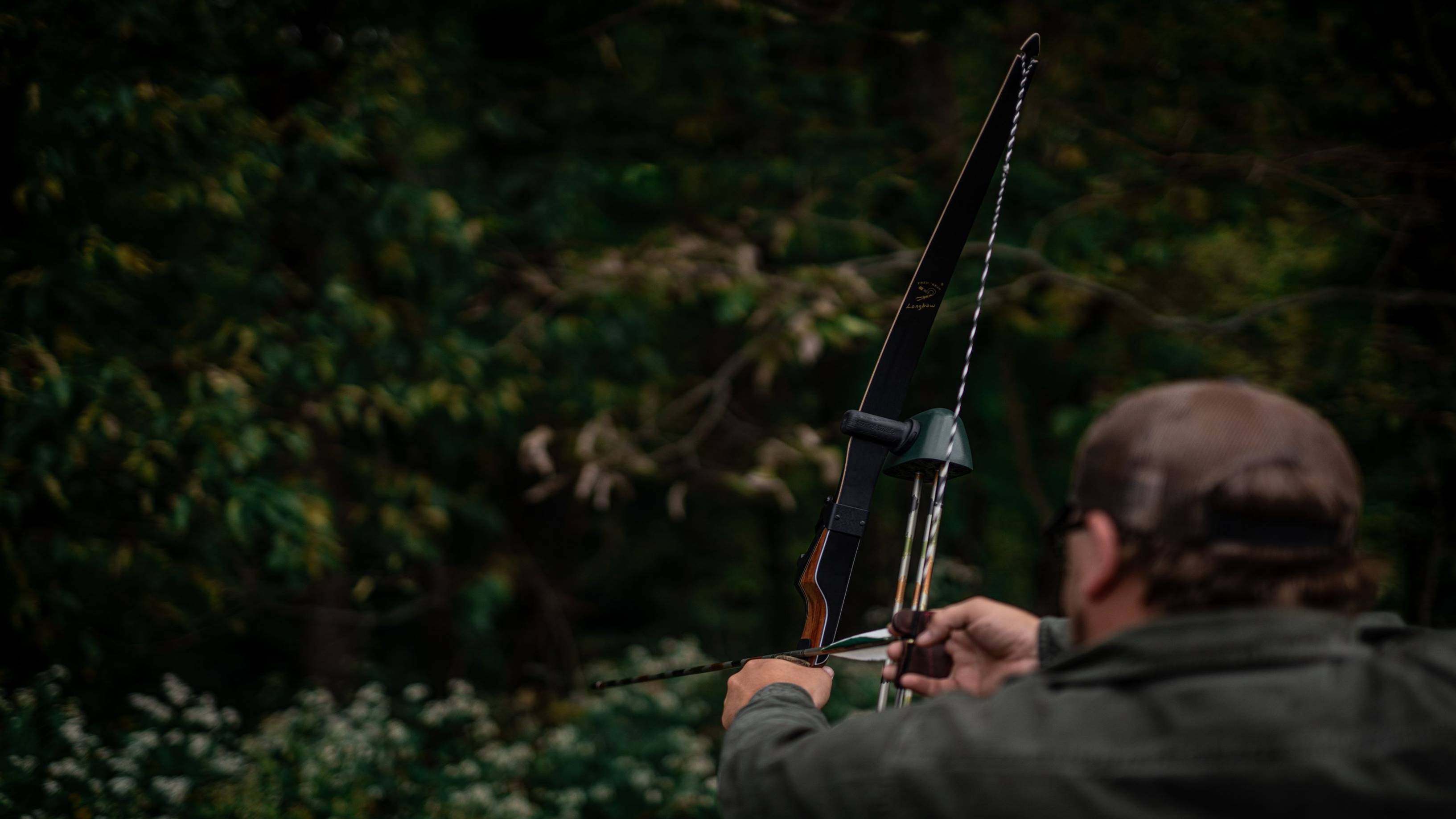 Man using Bear Archery Take Down Longbow Limbs