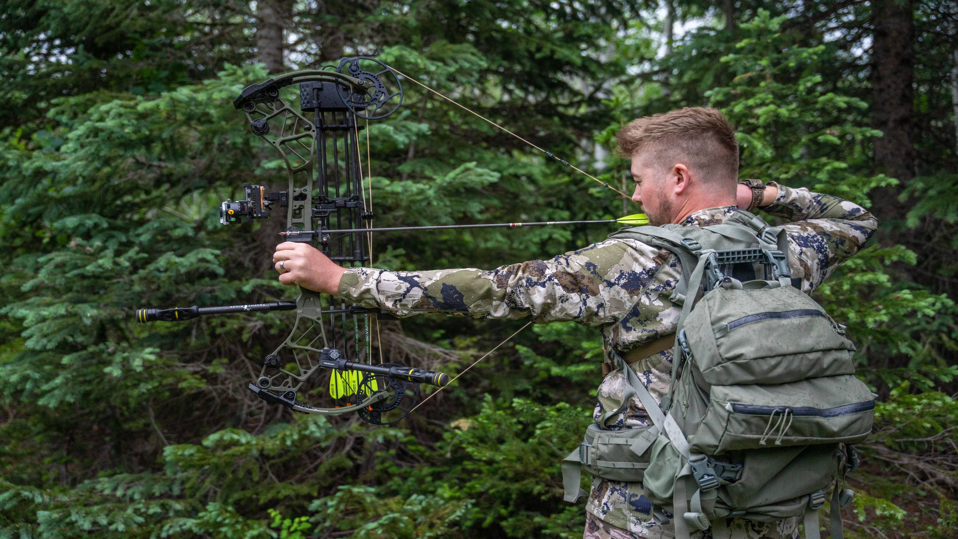 Man shooting the Bear Archery Persist 2024 flagship compound bow.