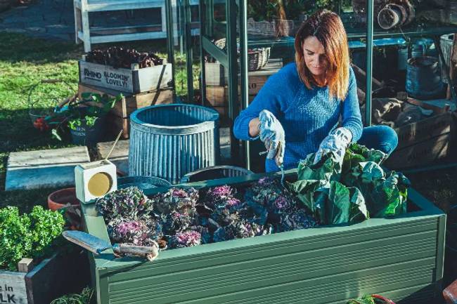 Lady planting in her Rhino aluminium raised bed