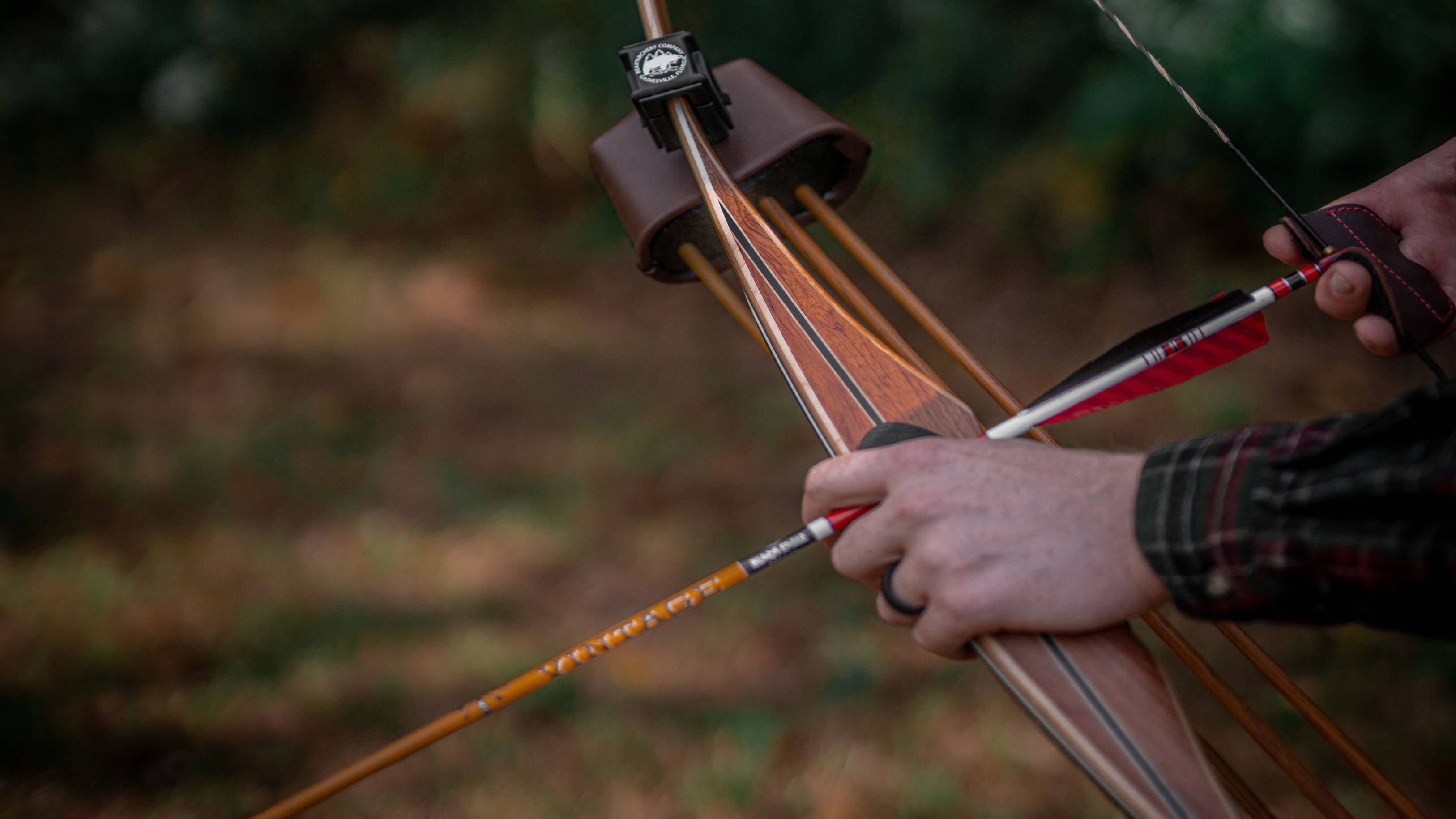 Person holding the Au Sable Longbow from Bear Archery 