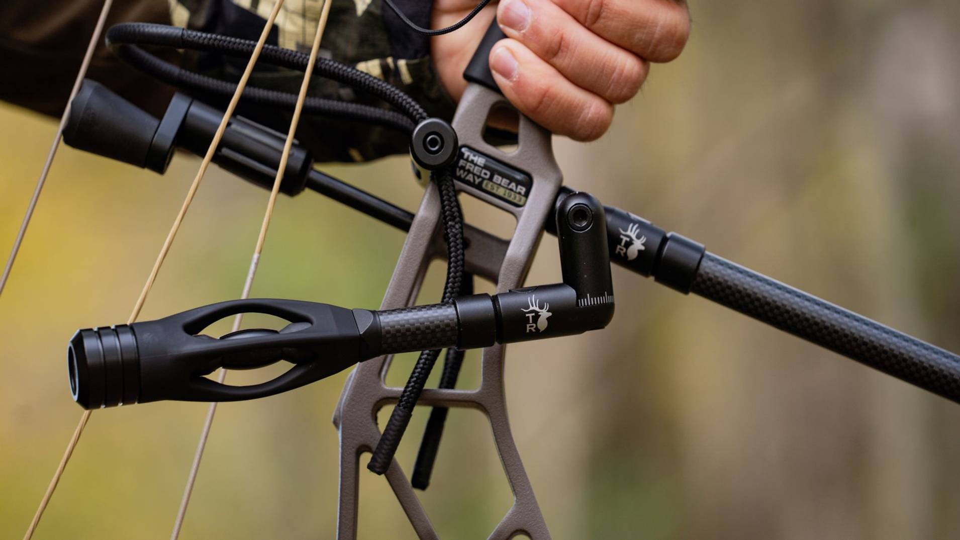 Close up of the Seismic Backbar on a Bear Archery compound bow