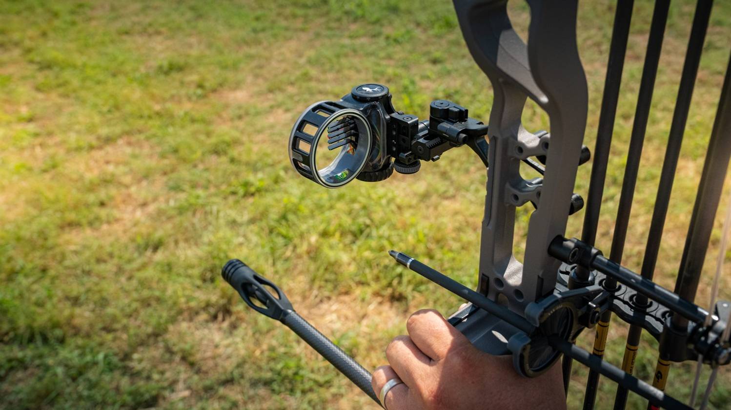 Image of the React 5 Max bow sight from Trophy Ridge on a compound bow.