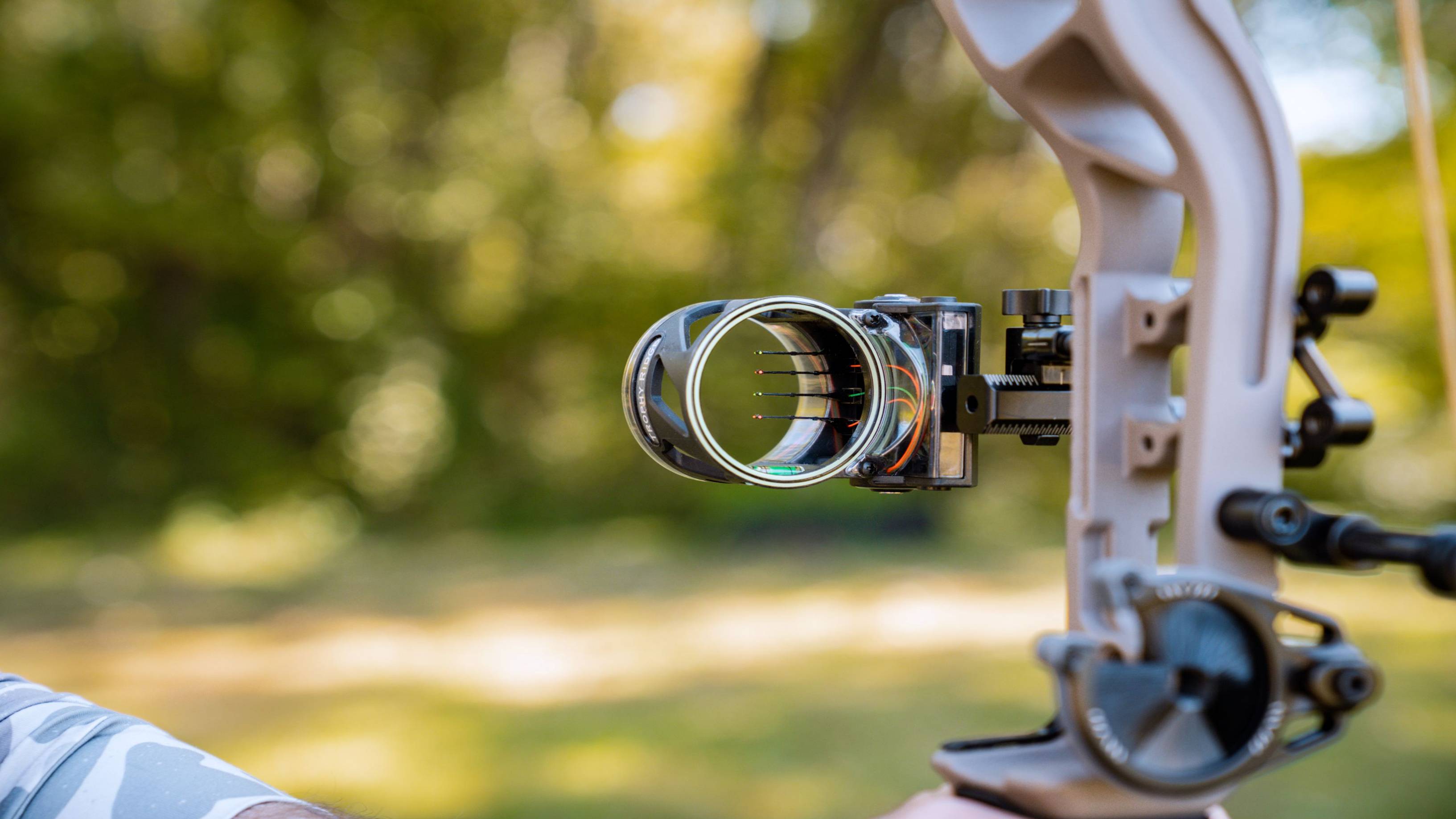 Close up of Trophy Ridge React H4X bow sight mounted on a bow.