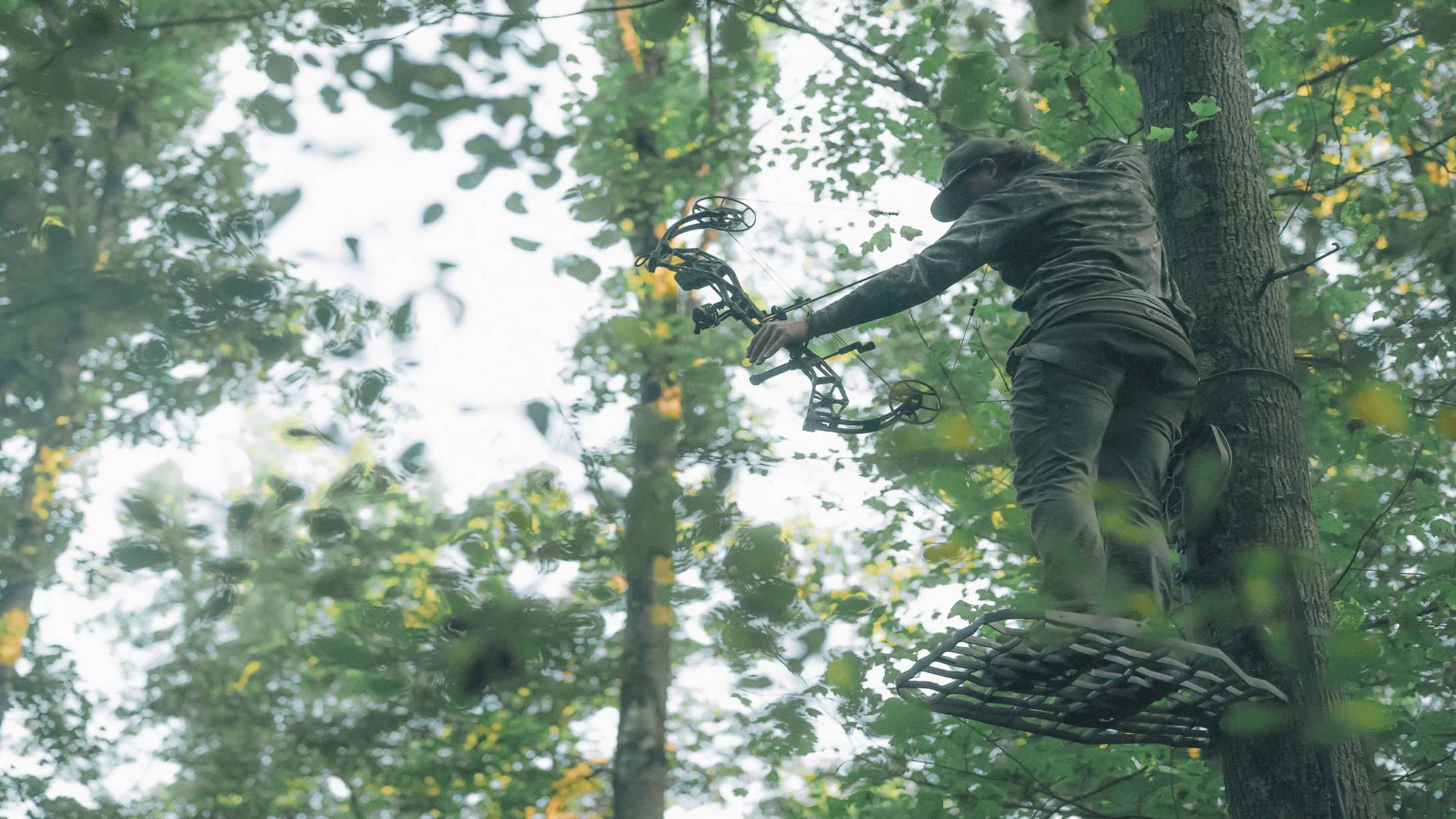Man hunting with the Paradigm Pro compound bow from Bear Archery
