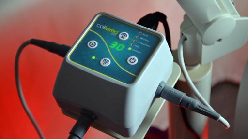 Celluma ELITE Controller displaying all 5 FDA cleared treatment modes for Acne, Wrinkles, Aches & Pains, Hair Growth, and Body Contouring.