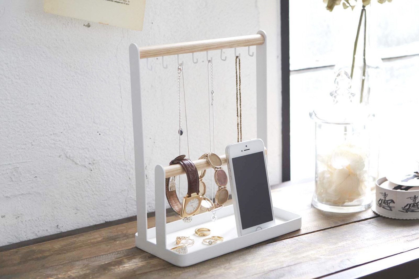Yamazaki home Jewelry + Accessory Display holding jewelry and watches. 