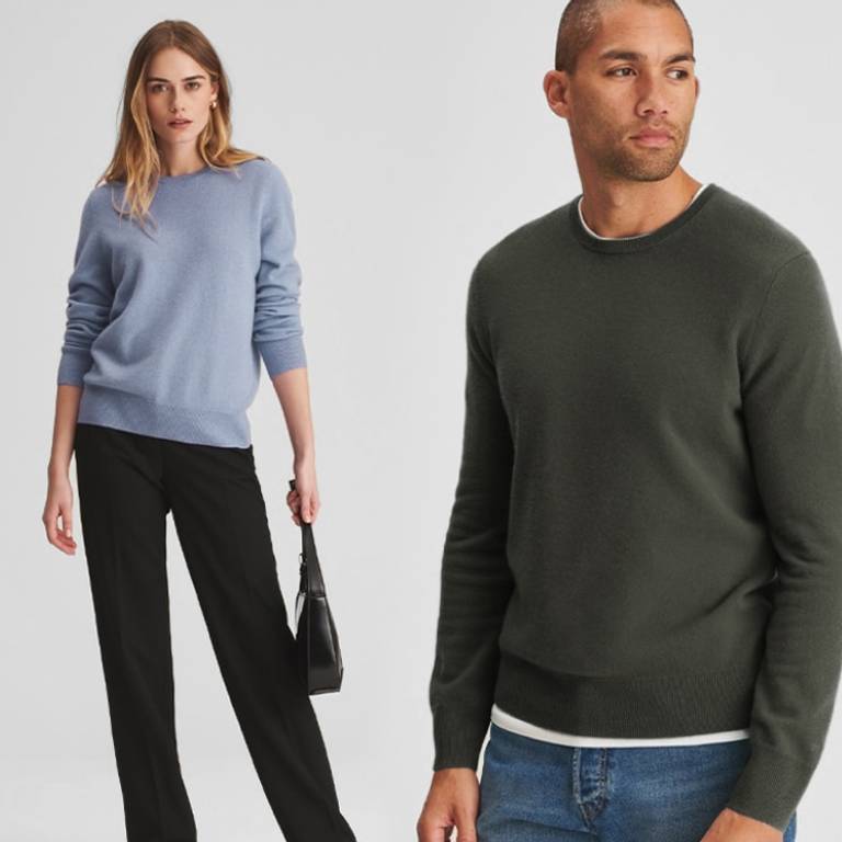 Models wearing the Women's Essential $75 Cashmere Sweater in Blue Denim and Men's Essential $75 Cashmere Sweater in Olive