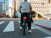 Man at a stop light riding the Radster Road. 