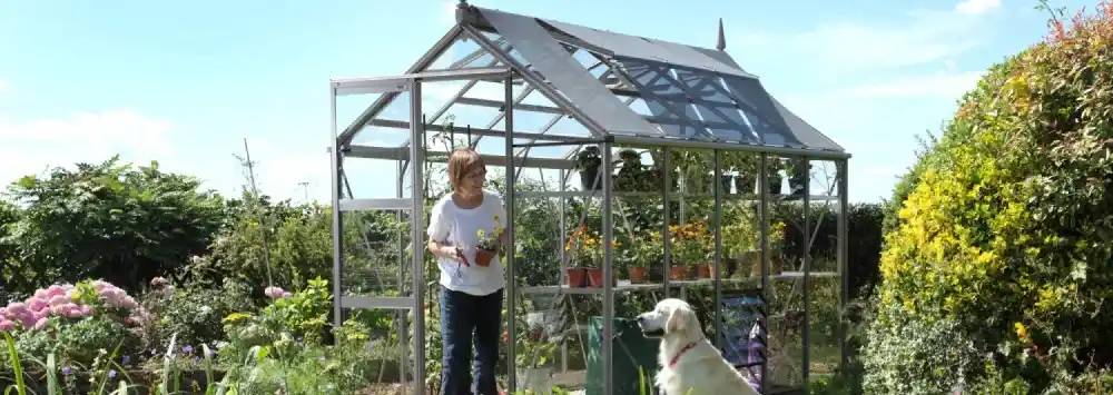 Rhino Premium 6x10 greenhouse next to a pond