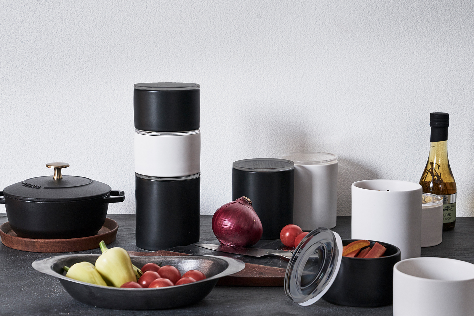 Group shot of Yamazaki Home Ceramic Canister in black and white. 