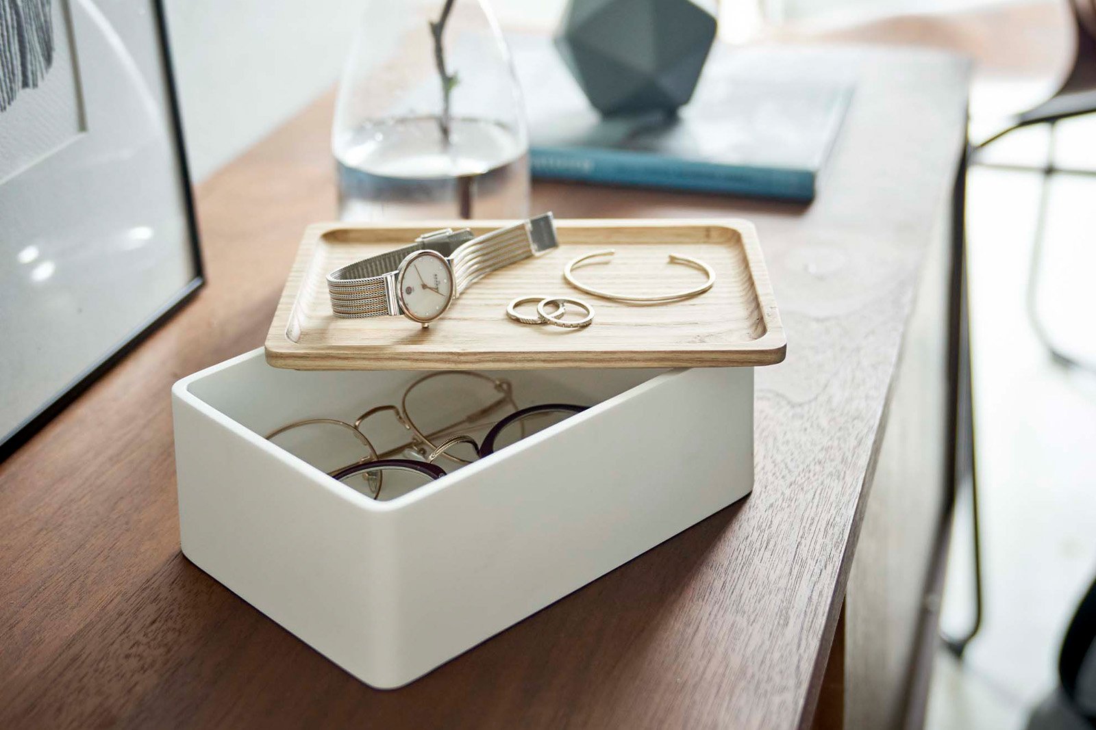 Yamazaki Home white Accessory Box holding glasses and a watch and jewelry on a counter.