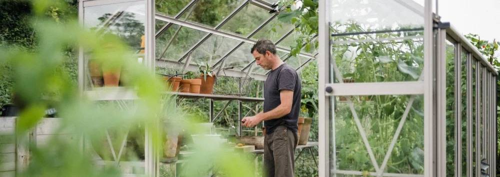 Gill in his Rhino greenhouse