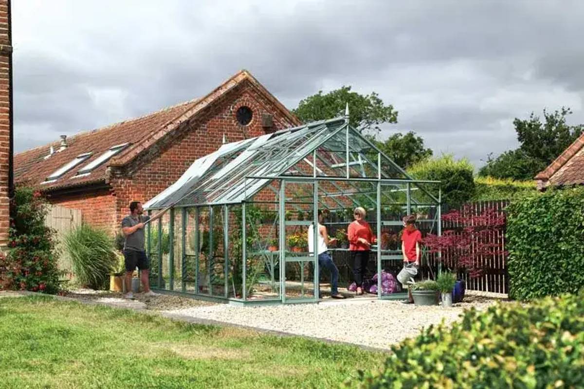 Large Rhino Premium Greenhouse finished in blue grass