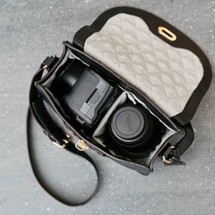 Organized Interior: The internal padding is designed to protect your DSLR camera.