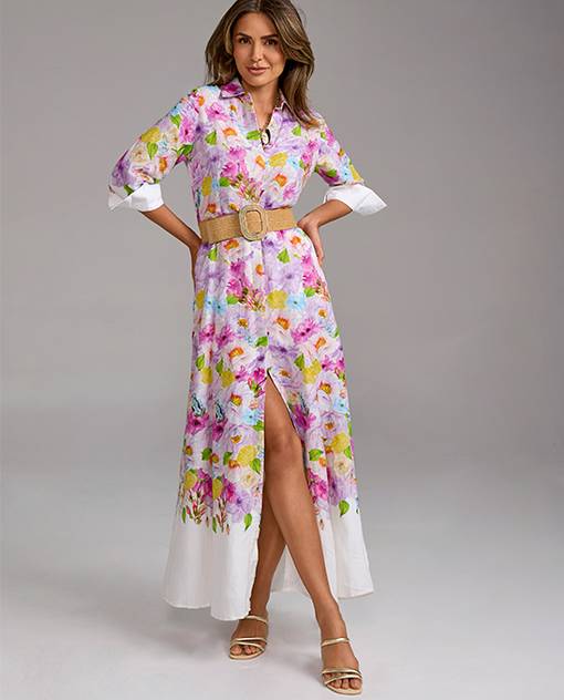 Models wearing a muti print dress with a straw belt