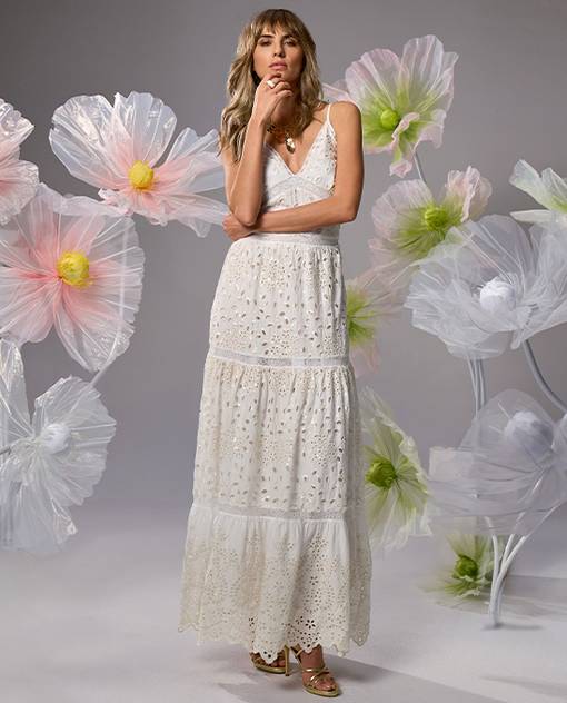 models wearing white maxi dress