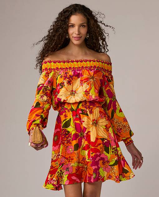 Models wearing a off the shoulder floral dress.