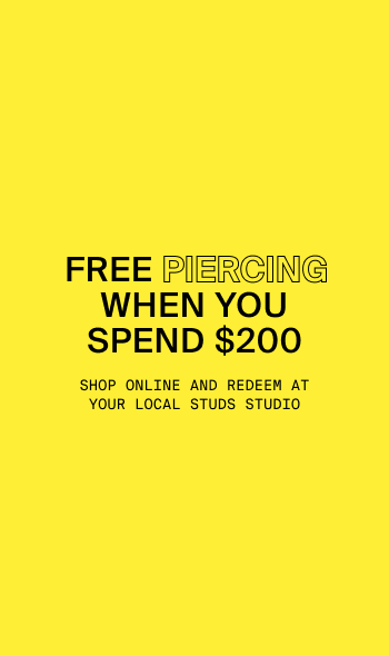 Graphic highlighting the Free Piercing when you spend $200 online. Shop online and redeem in your local STUDS studio.