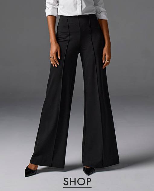 Model is wearing wide leg black pant.