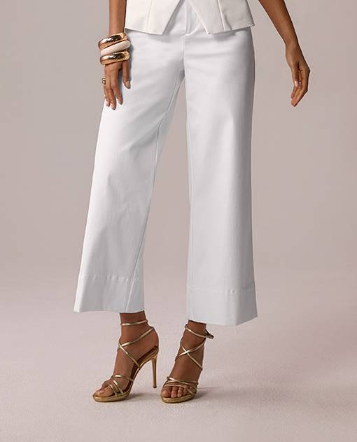 models wearing white wide leg pants