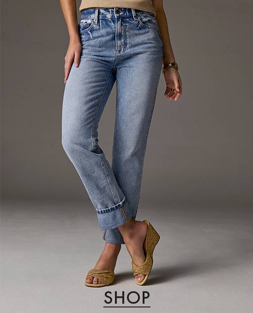 Model is wearing relaxed slim straight jeans.