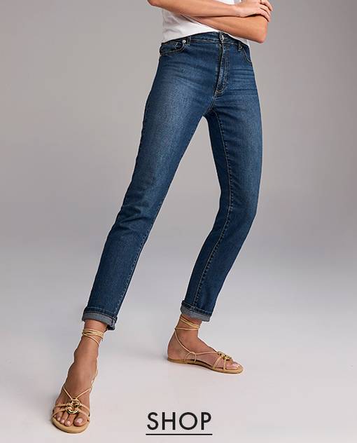 Models wearing a skinny jean with cuffed bottom.