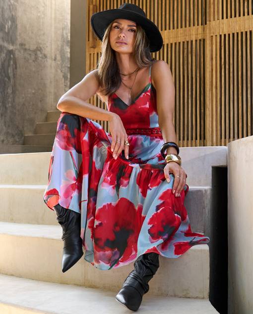 Models wearing red and blue floral maxi dress