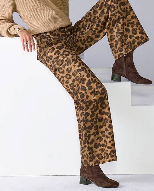 Models wearing cheetah pants