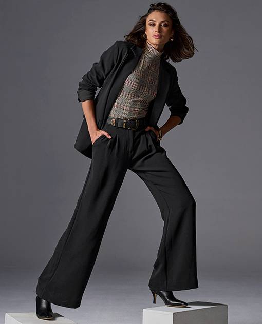 models wearing matching black suit