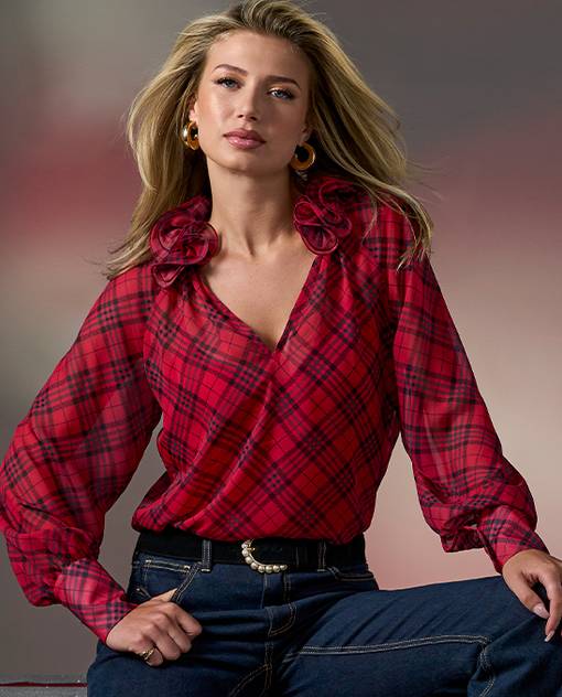 models wearing red and black plaid top