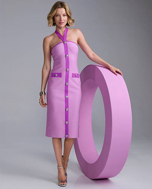 Models wearing a purple bandage dress.