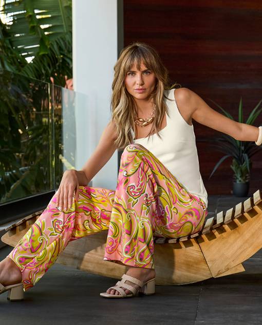 models wearing paisley pants and white tank