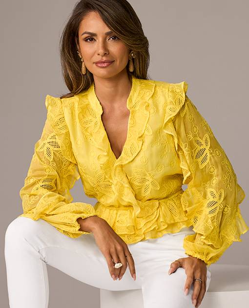 Models wearing a yellow blouse.