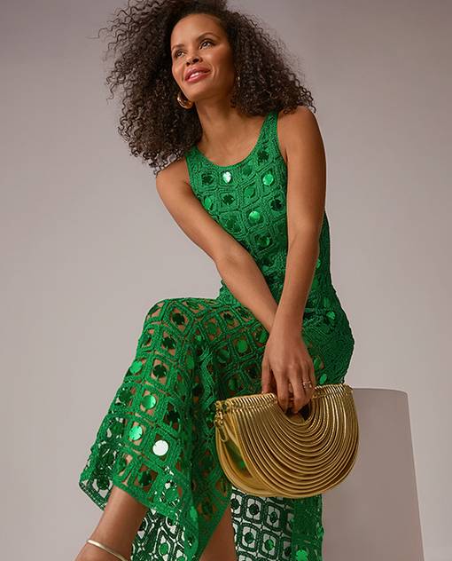models wearing green dress
