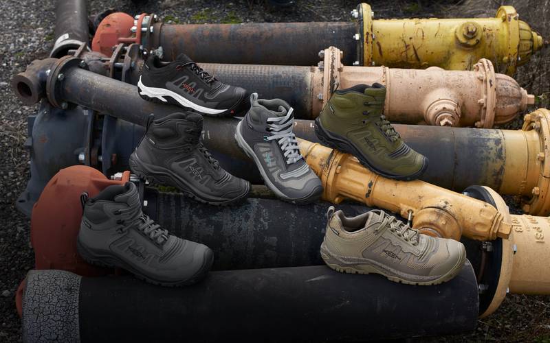 Product shot of the KEEN work-hike collection placed on fire hydrants 