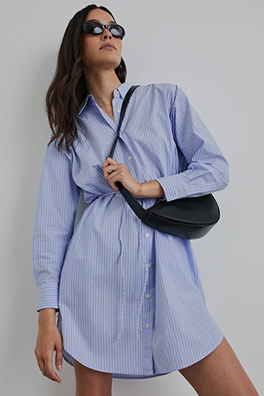 FRONT IMAGE OF MODEL WEARING HARMONY DRESS IN OXFORD WHITE STRIPE