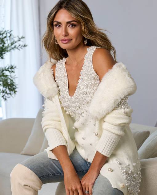 Models wearing off white pearl embellished duster
