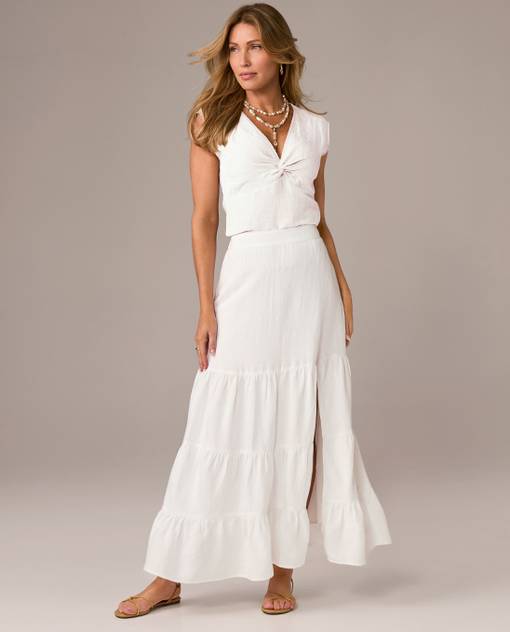 Models wearing a white skirt