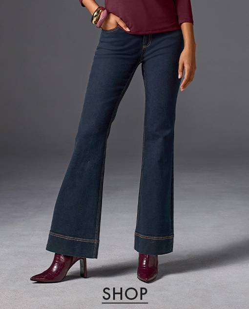 model is wearing bootcut denim