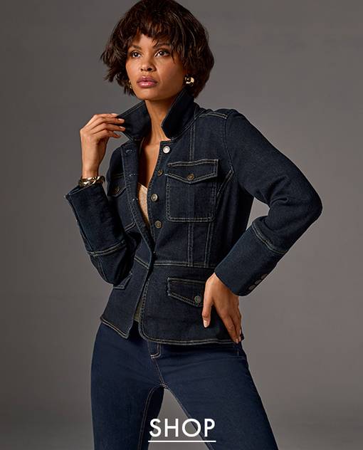 Model is wearing dark wash denim jacket and jeans.