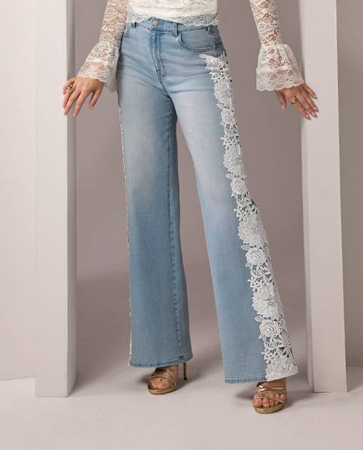 models wearing light wash jeans with white lace detailing