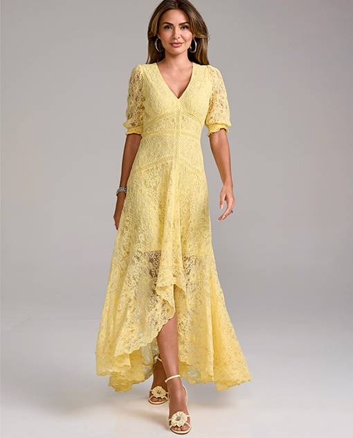 Models wearing a yellow lace dress.