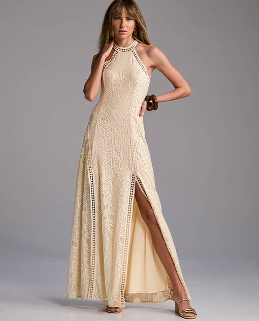 Models wearing a tan high neck dress.