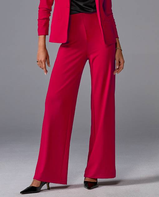 models wearing red wide leg pants