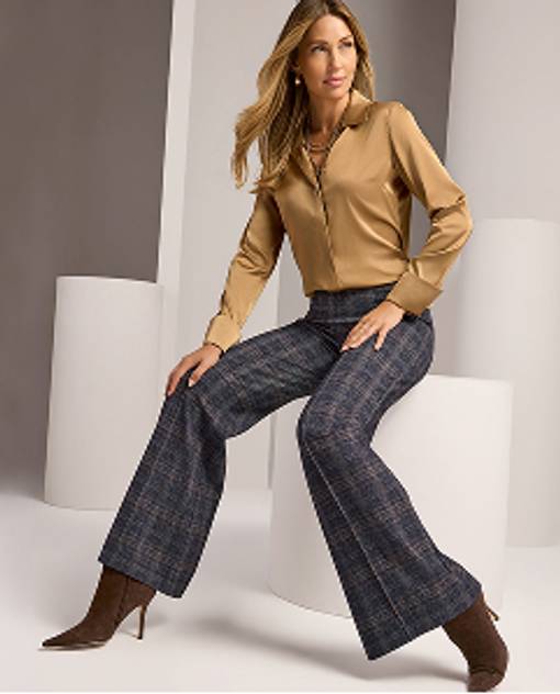 model wears gray plaid pants