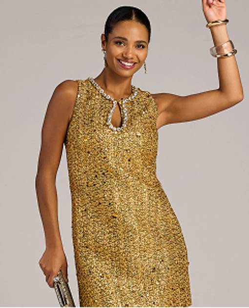 Models wearing a gold sequin dress